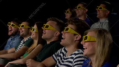 Young people watch movies in cinema: comedy in 3D