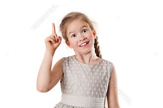 Joyful girl shows a finger up