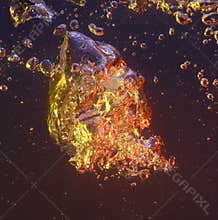 Air bubble floats in water