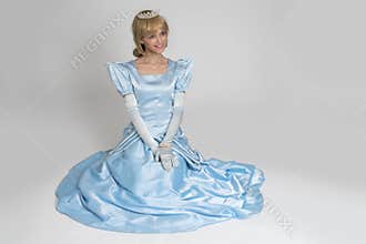 Fairytale princess. Portrait of happy woman in crown