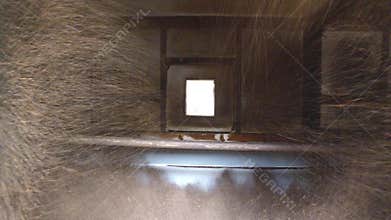 Machine pouring dry tea raw or grain to container