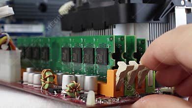 Motherboard with graphic card, fan and random access memory