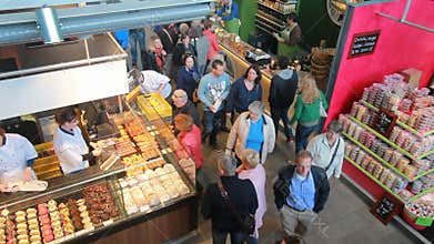 People shopping in indoor market