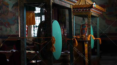 Buddhist monks beat drums. The sound is attached