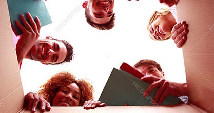 Inside view of boxes while friends moving things