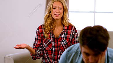 Annoyed couple arguing