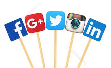 Popular social media logo signs printed on paper, cut and pasted on wooden stick