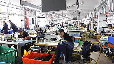 Chinese workers in a clothes factory
