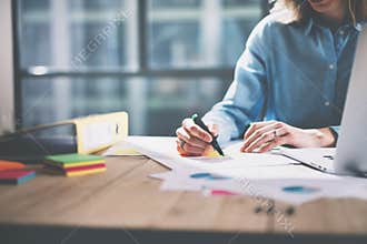 Photo young architect work concept. Woman working with new startup project in modern loft. Generic design notebook on