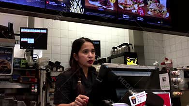 People ordering coffee at mcdonalds check out counter