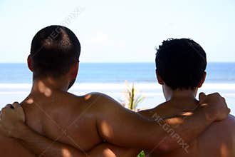 Two men hugging