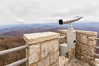 Stationary binoculars on a mountain Akhun in Sochi. Russia