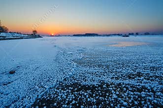 The frozen river sunrise