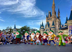 Seven dwarfs performancing at Walt Disney World Christmas party