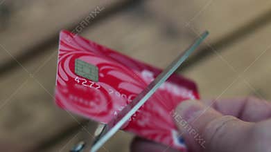 Cutting credit card scissors