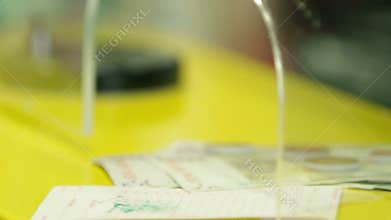 Close up on money counting in bank