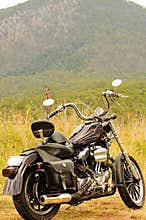 A motorbike on a road trip summer holiday touring outback Australia
