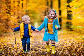 Kids playing in autumn park