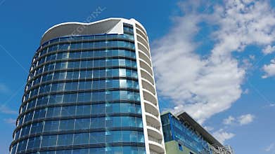 Office building and Clouds