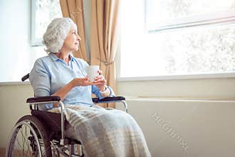 Senior lonely woman in wheelchair