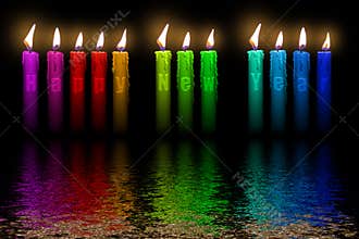 Color candles Happy New Year flooding in water