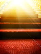 Stairs covered with red carpet