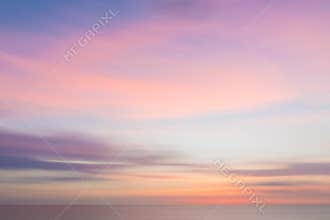 Blurred sunset sky and ocean