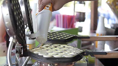Making Hong Kong style egg waffle on street.