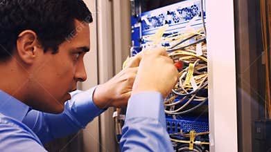 Technician fixing cable