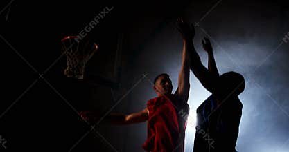 Sportsmen playing basketball