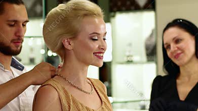 Jewelry store, Expensive purchase in a jewelry store gold chain for luxury women, buying in jewelry store, gold in the