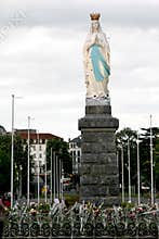 Flowers for Virgin Mary in pilgrim town Lourdes