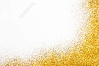 Golden glitter sand texture frame on white, abstract background.