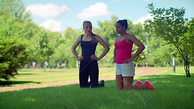 Fitness women preparing to workout outdoor. Multiracial woman breathing deep