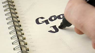 Popular slogan written in a notebook