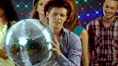 Man with friends dancing in nightclub. 4k.