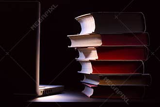Books and laptop. Education concept.