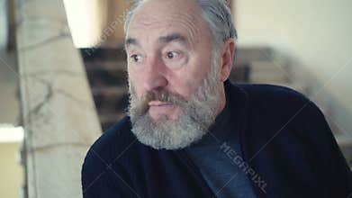 Irritated old man shouting emitionally in 4K