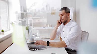 Businessman calling on smartphone at office