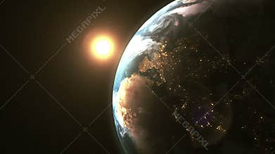 Stunning beautiful dawn in space, the sun comes from behind the planet Earth