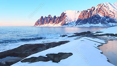 Sunset over the Okshornan mountain range at the island of Senja in Northern Norway