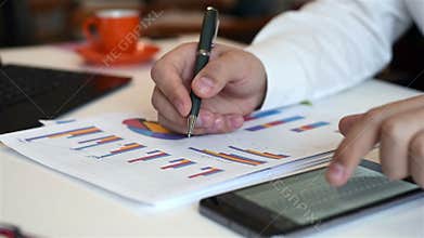 Business Broker Analyzing Stock Charts