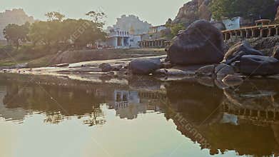 View from Calm River to Old Beautiful Indian Town on Flat Bank