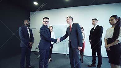Businessmen shaking hands