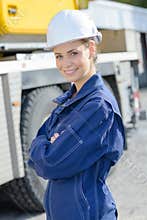 Portrait woman in boilersuit and hardhat