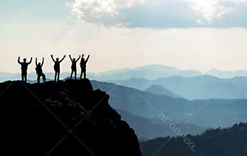 Team on mountain top & Successful people