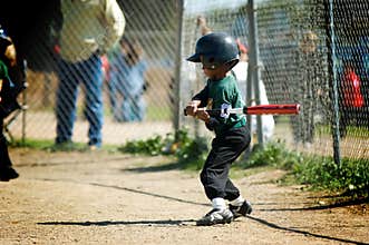 Boy practicing his tball swing