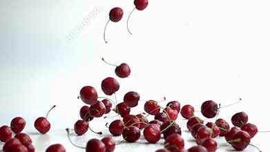 cherries falling in slow motion