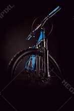 Mountain bicycle photography in studio, cushioning bike frame parts, handle bar and brakes