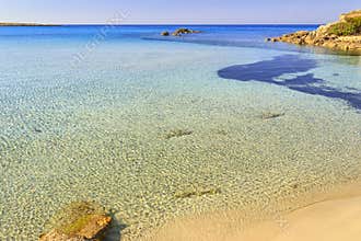 Summer seascape,Apulia coast: Marina di Pulsano beach Taranto, location `Lido Silvana`.